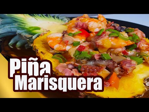 pina-rellena-de-mariscos-con-queso-fundido-bebida-toque-y-sazon